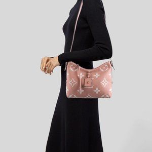 LOUIS VUITTON 2023 Monogram Giant Bicolor Empreinte CarryAll PM